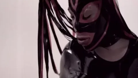 Tranny In Latex Bodysuit